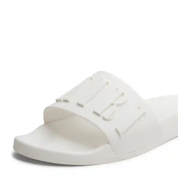 Amiri logo pool slides